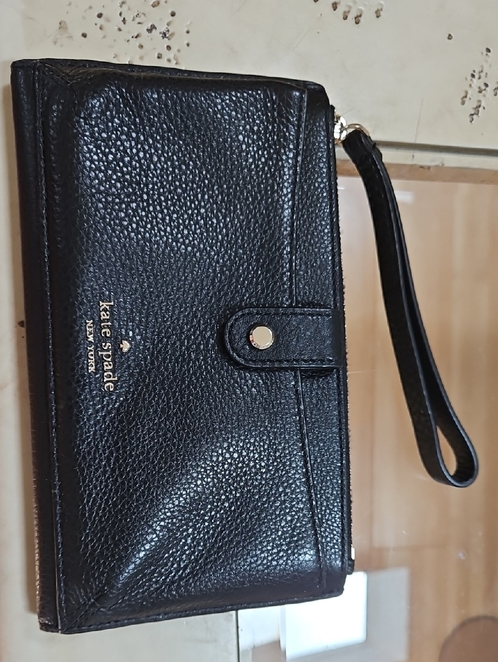kate spade Black Pebbled Leather Wristlet with Gold Logo